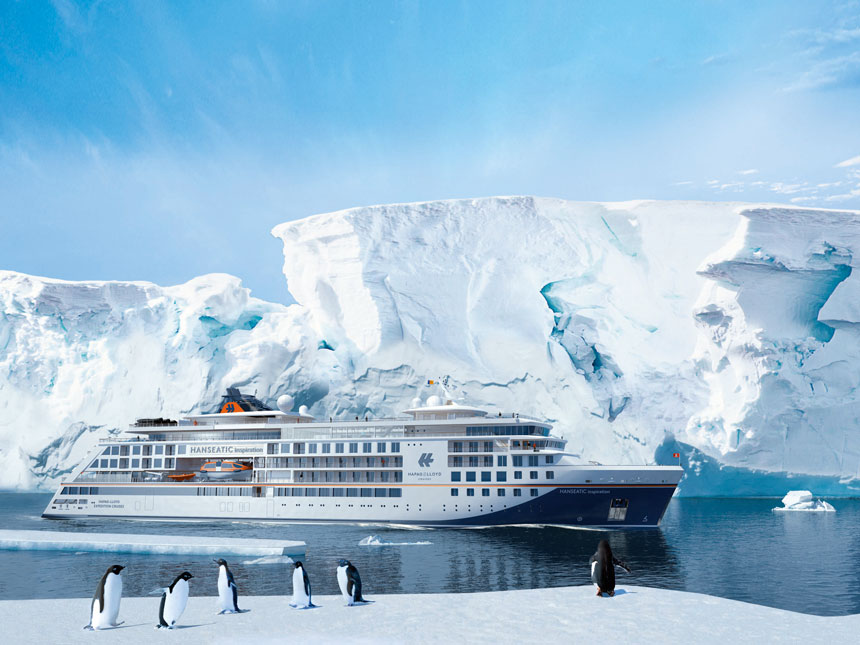 Hapag-Lloyd Cruises Expeditionskreuzfahrtschiff in der Antarktis mit Pinguinen vor Eisberg